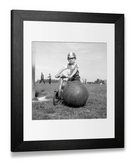 Framed Print : On Guard! Standing sentry duty over a ball almost as big as himself is 5 yr old Russell Framed Print : On Guard! Standing sentry duty over a ball almost as big as himself is 5 yr old Russell