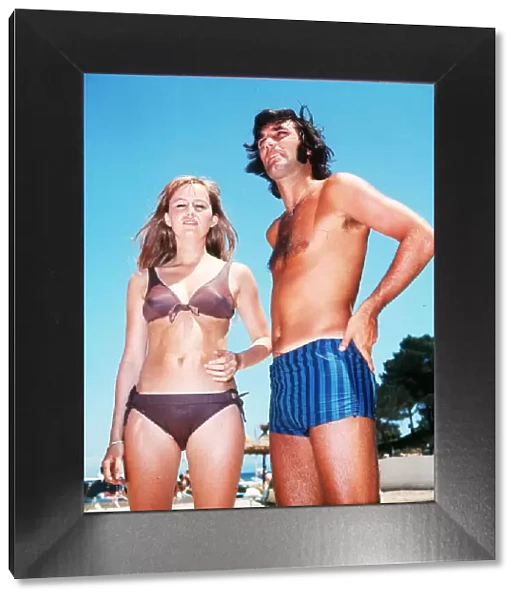 George Best football player with actress Susan George on holiday in Palma Majorca in