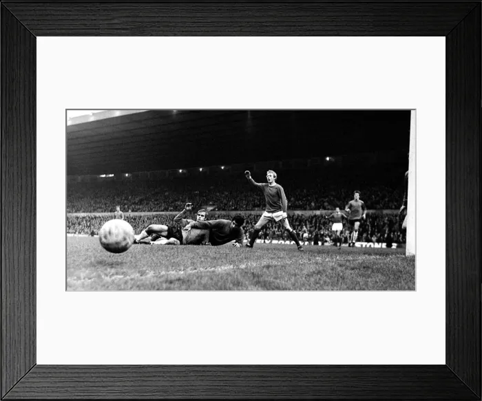 Framed Print : Manchester Uniteds Denis Law appeals for a corner kick as Ipswich goalkeeper hancock Framed Print : Manchester Uniteds Denis Law appeals for a corner kick as Ipswich goalkeeper hancock