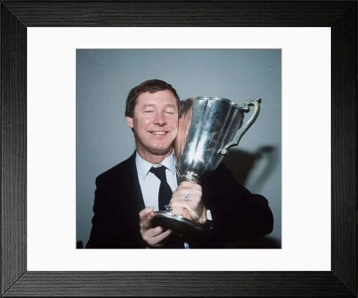 Framed Print : Aberdeen manager Alex Ferguson holding the European Cup Winners Cup trophy after hi side Framed Print : Aberdeen manager Alex Ferguson holding the European Cup Winners Cup trophy after hi side