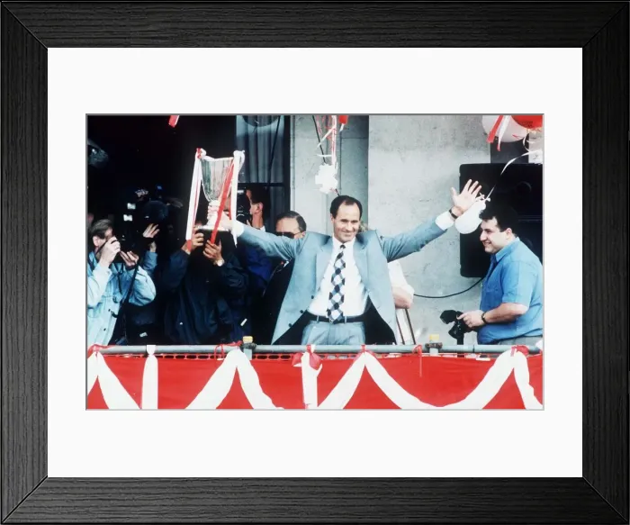 Framed Print : Arsenal manager George Graham shows off European cup winners cup trophy to crowds of