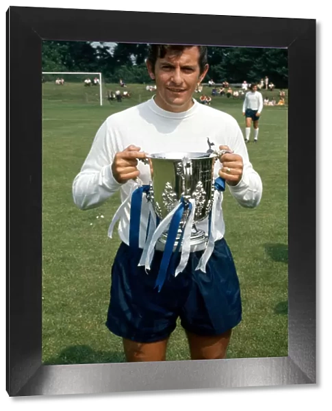 Tottenham Hotspur footballer Alan Mullery with the League Cup trophy August 1971