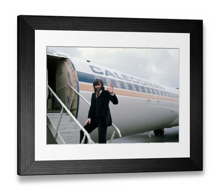 Framed Print : Manchester United footballer George Best waves before boarding his plane October Framed Print : Manchester United footballer George Best waves before boarding his plane October
