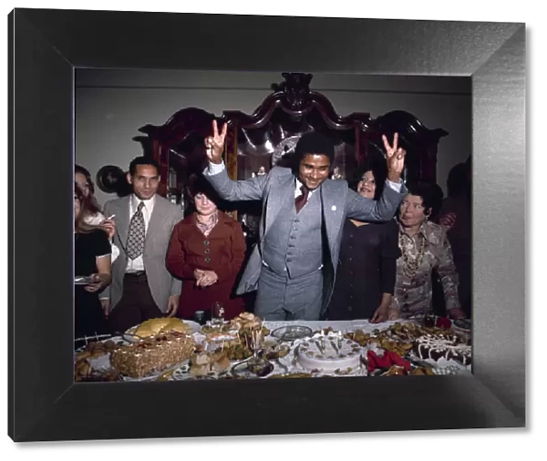 Legendary footballer Eusebio of Portugal celebrates his 30th birthday with members of his