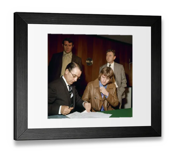 Framed Print : Footballer Rodney Marsh signs his contarct to join Manchester City Manager Malcolm Framed Print : Footballer Rodney Marsh signs his contarct to join Manchester City Manager Malcolm