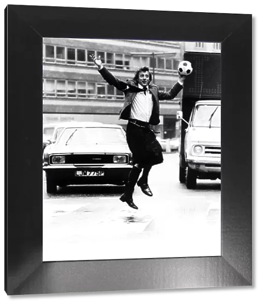 Denis Law wearing kilt in Regent Street London 1978 hours before leaving with