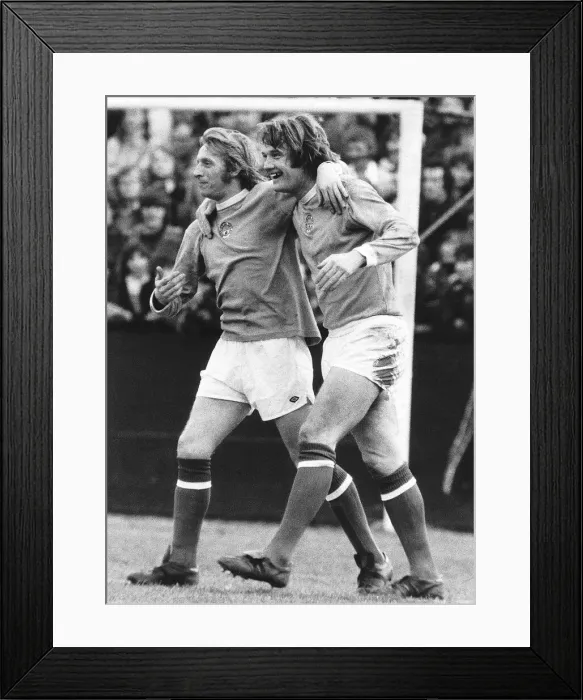 Framed Print : Denis Law congratulates Rodney Marsh January 1974 after scoring goal for Manchester Framed Print : Denis Law congratulates Rodney Marsh January 1974 after scoring goal for Manchester