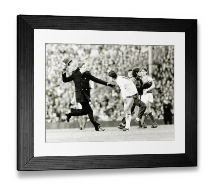 Framed Print : Spectator runs onto football pitch chased by policeman Arsenal v Tottenham