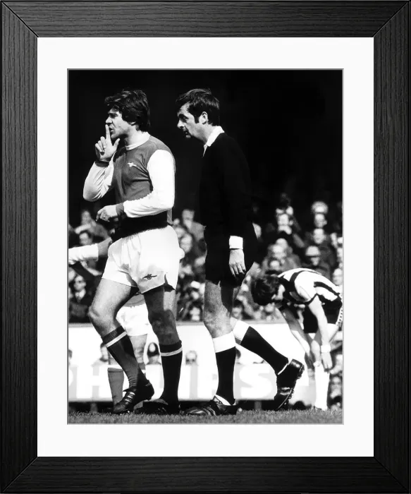 Framed Print : Malcolm MacDonald signals to Liam Brady April 1978 to keep quiet after a small Framed Print : Malcolm MacDonald signals to Liam Brady April 1978 to keep quiet after a small