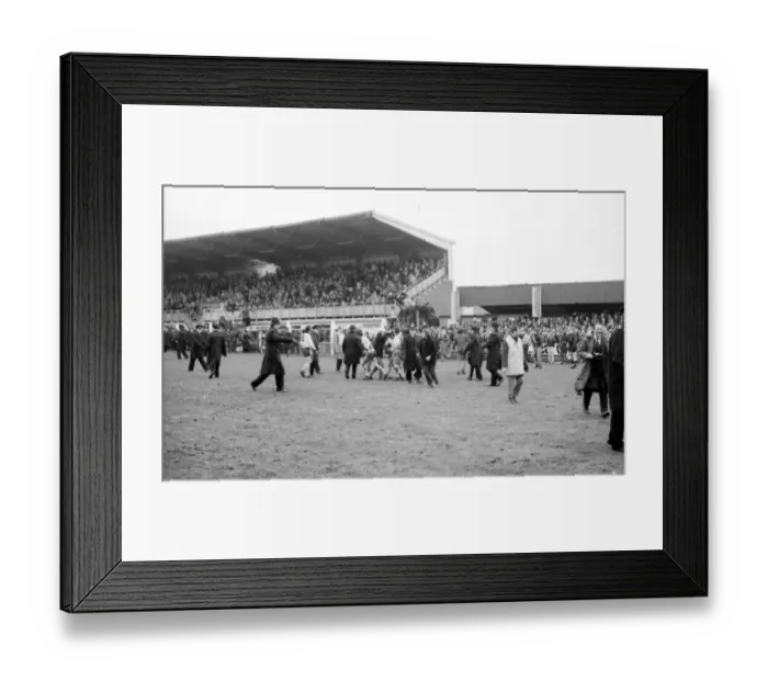 Framed Print : Hereford United fans celebrate by running on the pitch after second goal Hereford Framed Print : Hereford United fans celebrate by running on the pitch after second goal Hereford