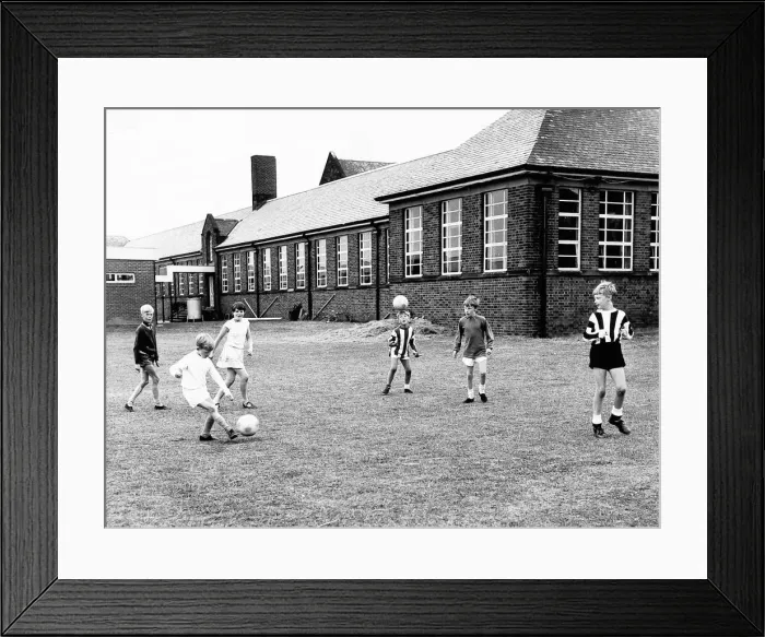 Framed Print : Children of Cragside Junior School go through their repertoire of soccer skills, 1969 Framed Print : Children of Cragside Junior School go through their repertoire of soccer skills, 1969