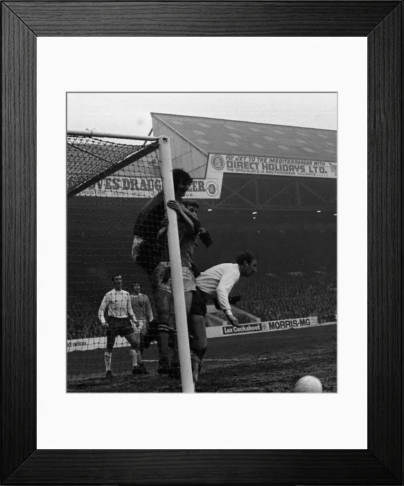 Framed Print : Jack Charlton backs into Man Citys Joe Corrigan during the Manchester City v Leeds