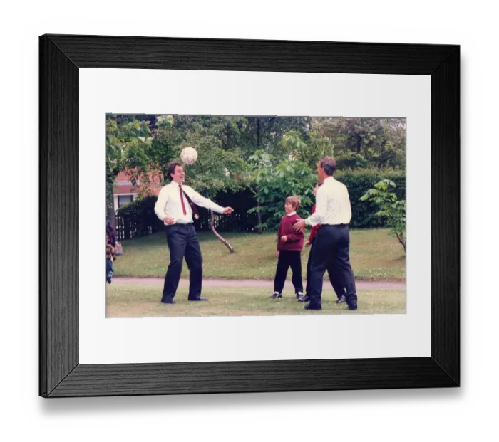 Framed Print : Prime Minister Tony Blair and ex FIFA football referee George Courtney play football Framed Print : Prime Minister Tony Blair and ex FIFA football referee George Courtney play football