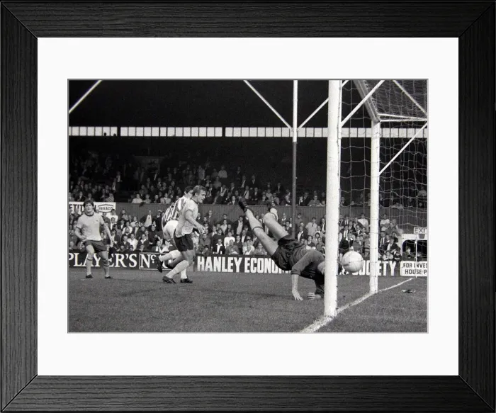Framed Print : English League Division match Stoke City v Arsenal Stoke centre Ritchie heads to Framed Print : English League Division match Stoke City v Arsenal Stoke centre Ritchie heads to
