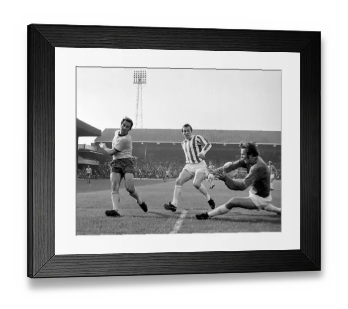 Framed Print : English League Division match Stoke City v Arsenal Stoke goalkeeper Farmer blocks a Framed Print : English League Division match Stoke City v Arsenal Stoke goalkeeper Farmer blocks a