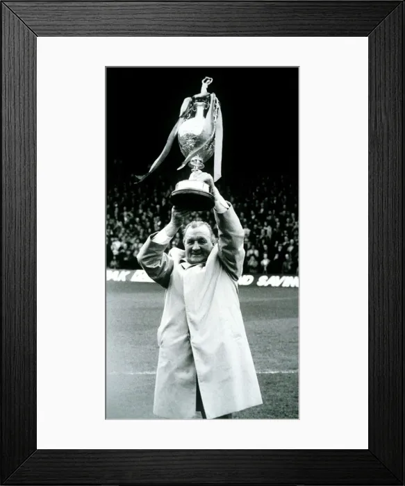 Framed Print : Bob Paisley ex Liverpool manager holding the League Champinship Trophy in 1983