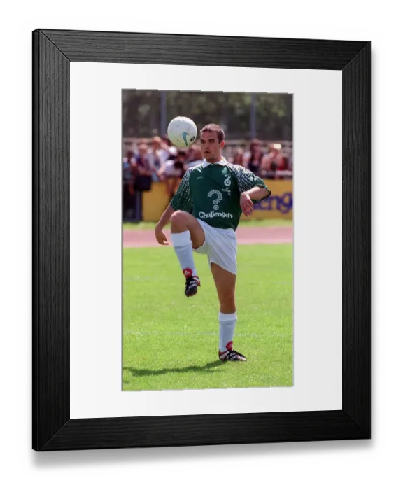 Framed Print : Robbie Williams Singer May 1998 playing football during the celebrity soccer match Framed Print : Robbie Williams Singer May 1998 playing football during the celebrity soccer match