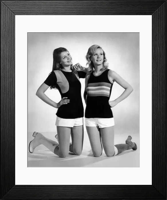 Framed Print : This pretty pair of team-mates are about to score in their black football vests Framed Print : This pretty pair of team-mates are about to score in their black football vests