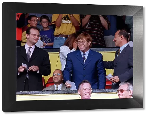 Elton John singer and Watford FC Chairman receiving a standing ovation at Vicarage Road