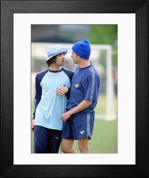 Framed Print : Liam Gallagher and Damon Albarn -May 1996 Come head to head in friendly Oasis v