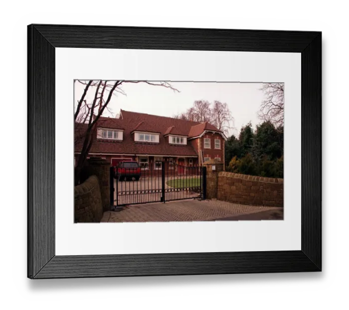 Framed Print : Manchester United football player Dwight Yorke has turned his Bramnall home in South Framed Print : Manchester United football player Dwight Yorke has turned his Bramnall home in South