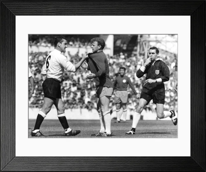 : Dave Mackay of Tottenham Hotspurs confronts Billy Bremner of Leeds during the First : Dave Mackay of Tottenham Hotspurs confronts Billy Bremner of Leeds during the First