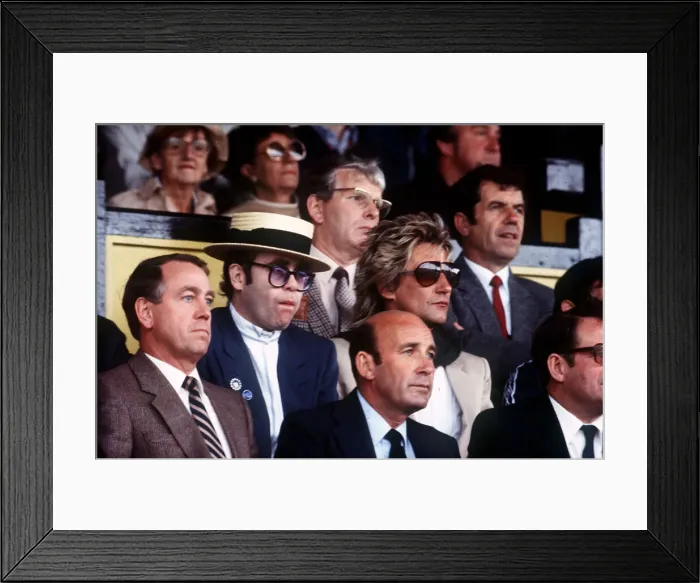 Framed Print : Elton John and Rod Stewart enjoy a football match at Watford