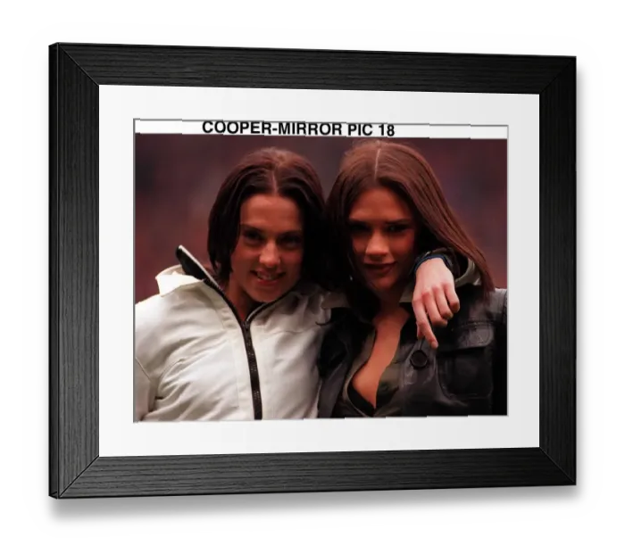 Framed Print : Victoria Adams and Mel C members of pop group the Spice Girls suddenly likes football as