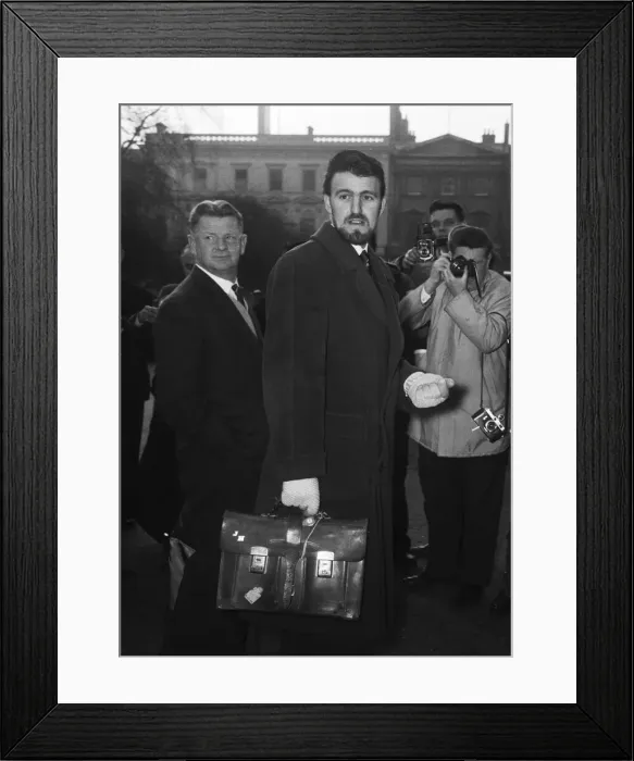 Framed Print : Blackburns goalie Jimmy Hill arriving at a football strike meeting at the Ministry