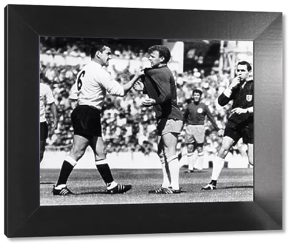 Dave Mackay footballer plays for Spurs V Leeds Utd He grabs Billy Bremner by the Shirt