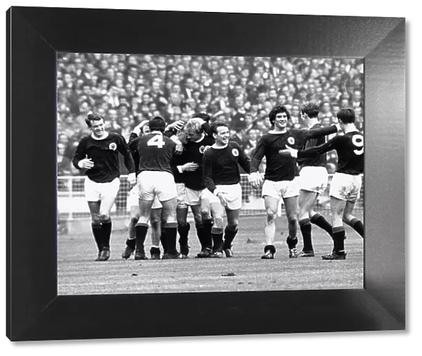Scotland football team celebrate scoring goal in victory over England at Wembley, 1967