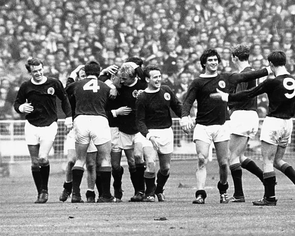 Scotland football team celebrate scoring goal in victory over England at Wembley, 1967