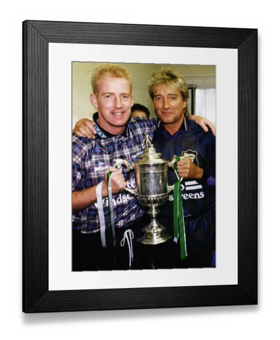 Framed Print : Tommy Burns Celtic football manager and singer Rod Stewart holding cup trophy at Davie