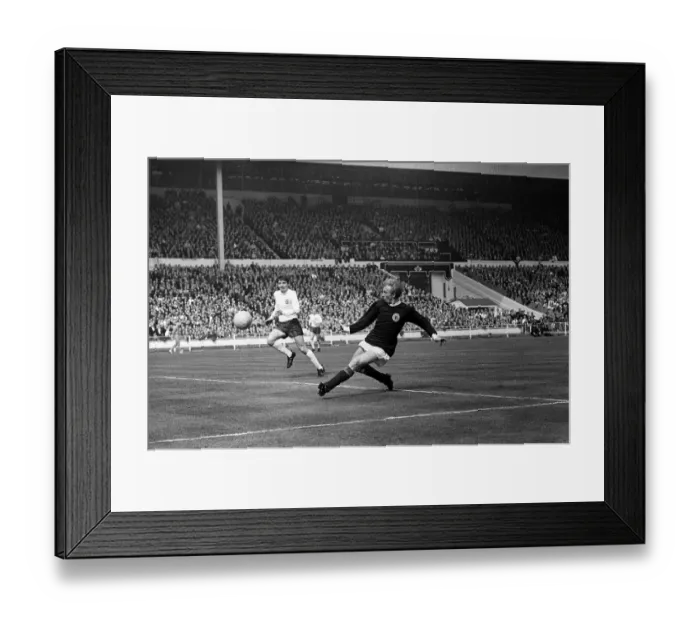 Framed Print : Denis Law & Martin Peters England v Scotland game 1967 Framed Print : Denis Law & Martin Peters England v Scotland game 1967