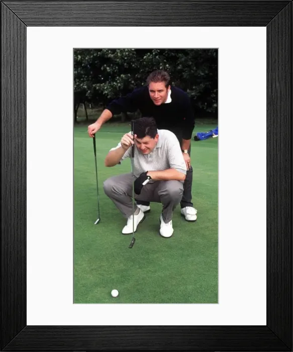 : John Parrott Snooker player with Ally McCoist Rangers football player during filming for : John Parrott Snooker player with Ally McCoist Rangers football player during filming for
