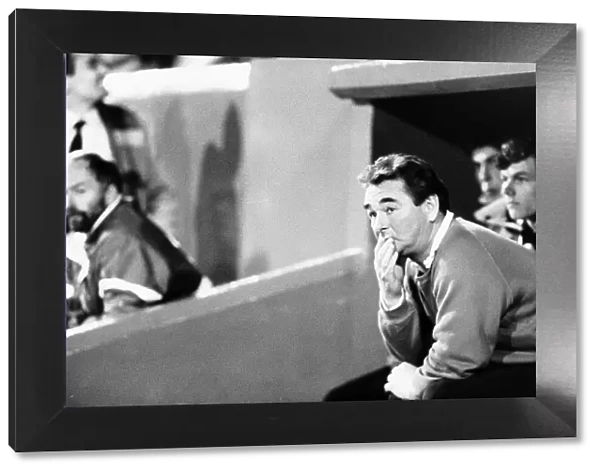 Brian Clough Football manager of Nottingham Forest FC sitting on team bench during match