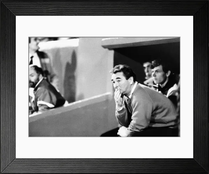 Framed Print : Brian Clough Football manager of Nottingham Forest FC sitting on team bench during match Framed Print : Brian Clough Football manager of Nottingham Forest FC sitting on team bench during match
