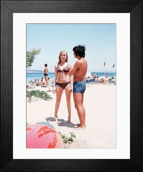 Framed Print : George Best Football Player and Susan George actress on holiday in Palma Nova Majorca Framed Print : George Best Football Player and Susan George actress on holiday in Palma Nova Majorca