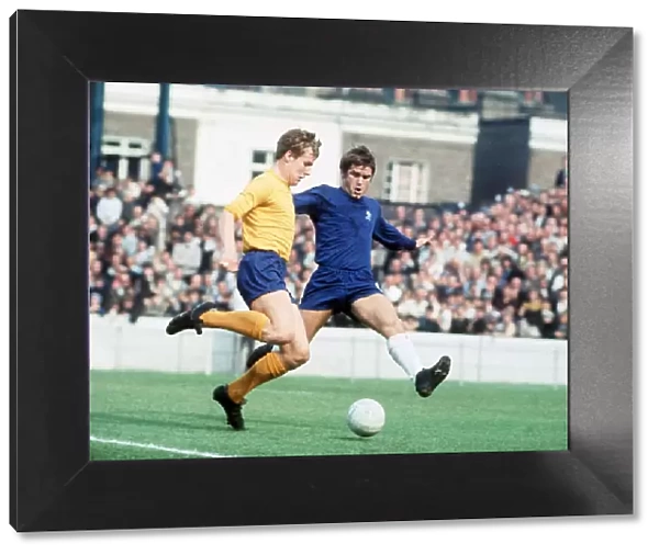 Joe Royle playing for Everton against Chelsea David Webb attempting to tackle him