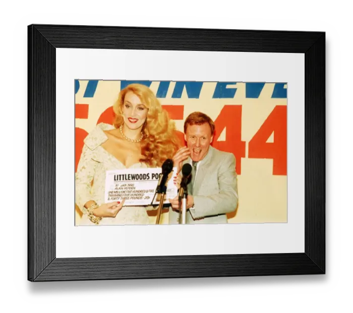 Framed Print : Football Pools winner Alan Hepden collects cheque from Model Jerry Hall