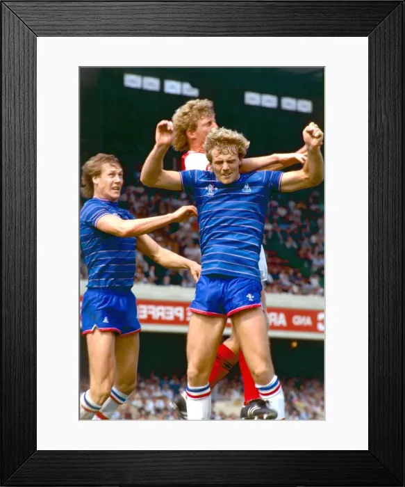 Framed Print : Footballers jumping up for a high ball in the air during the Chelsea v Arsenal football Framed Print : Footballers jumping up for a high ball in the air during the Chelsea v Arsenal football