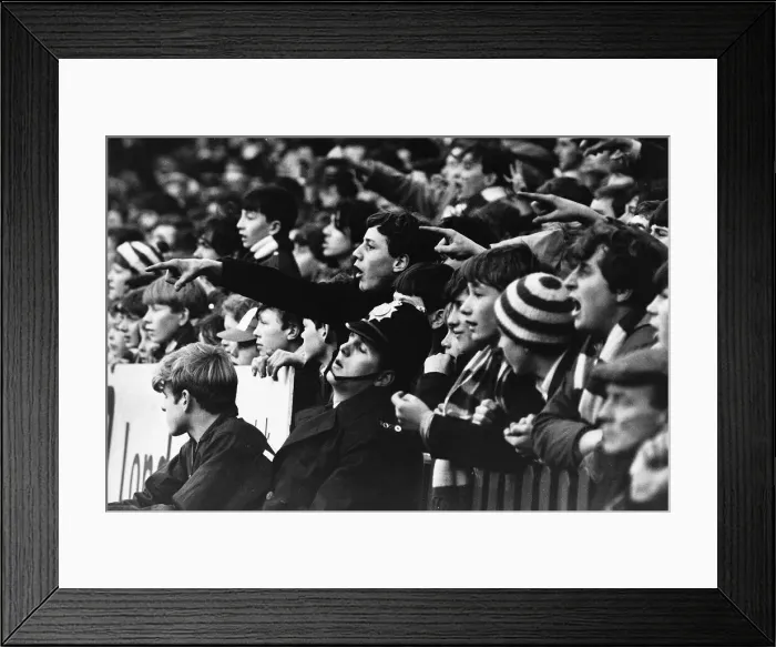 Framed Print : Manchester United fans fail to win the support of a policeman in 1966 Framed Print : Manchester United fans fail to win the support of a policeman in 1966