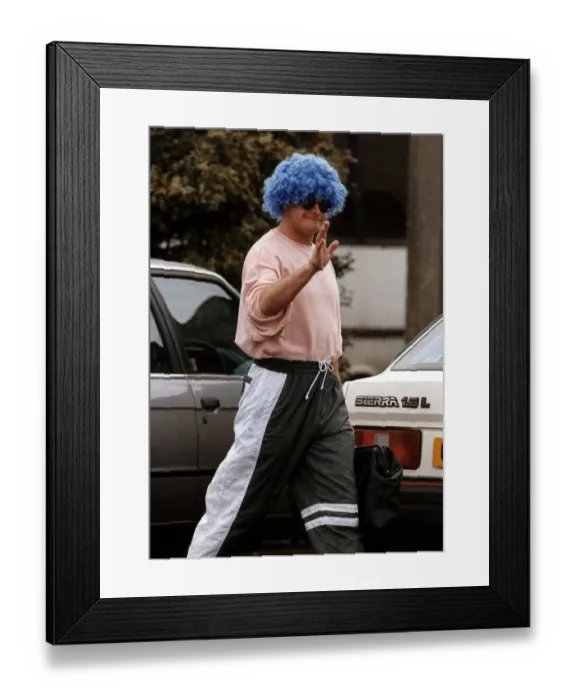 Framed Print : Paul Gascoigne in funny mode arrives for a training session DBase