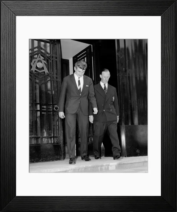 Framed Print : New Arsenal signing Joe Baker leaving Highbury with Arsenal team physiotherapist Bertie Framed Print : New Arsenal signing Joe Baker leaving Highbury with Arsenal team physiotherapist Bertie