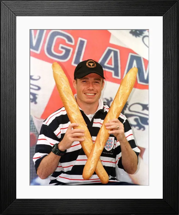Framed Print : Graeme Le Saux at England press conference June 1998 with baguettes prior to match