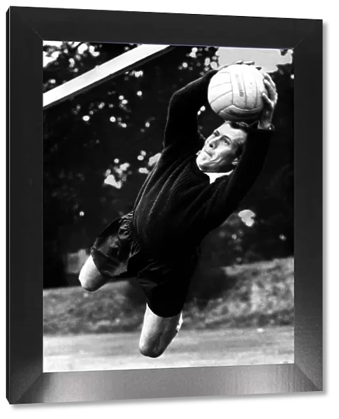 Jack Kelsey (Goalkeeper) Football Player of Arsenal - July 1959 in action - dives