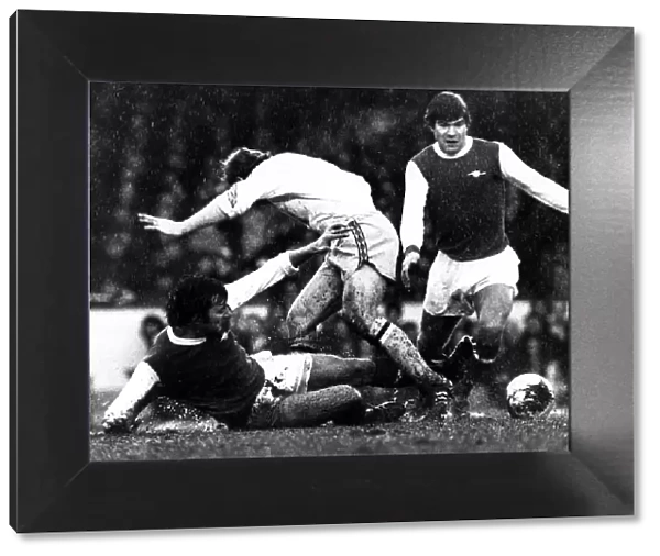 Malcolm McDonald Football Player of Arsenal - and Alan Hudson in action against