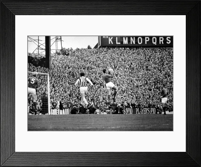 Framed Print : West Bromich Albion v Manchester United-Stepney collects as Astle of Albion flies in Framed Print : West Bromich Albion v Manchester United-Stepney collects as Astle of Albion flies in