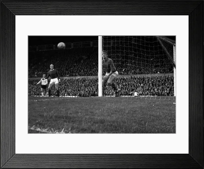 Framed Print : Manchester United v Stoke City-Alex Stepney watches as the ball comes back off his post