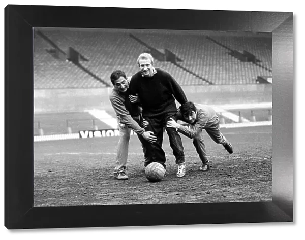 Manchester United Players training at Old Trafford-Dennis Law January 1967